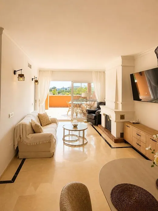 Elegant ground-floor 2-bedroom apartment with large terrace and direct access to communal gardens & pool · 5/16